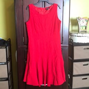 Red sleeveless dress.